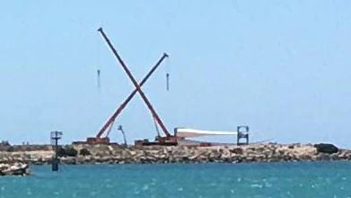 Wind turbines are unloaded at Geraldton Port today.