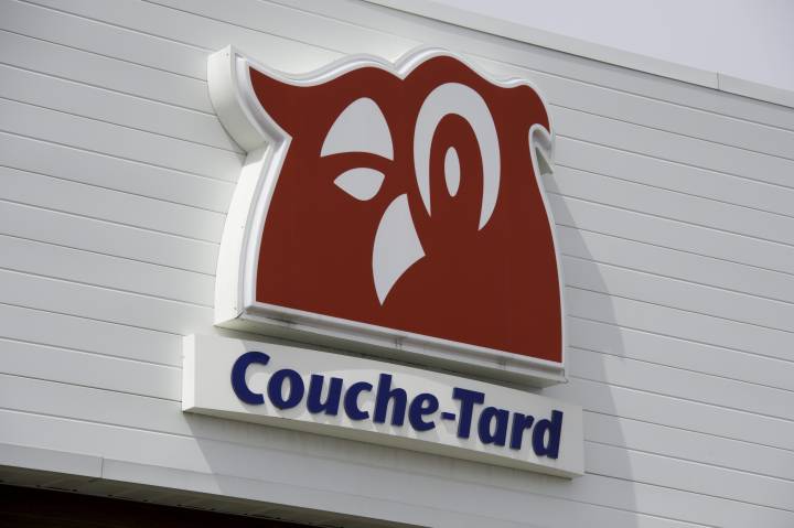 The logo of Couche-Tard corner store is pictured on a building in Gatineau, Quebec on April 24, 2018.