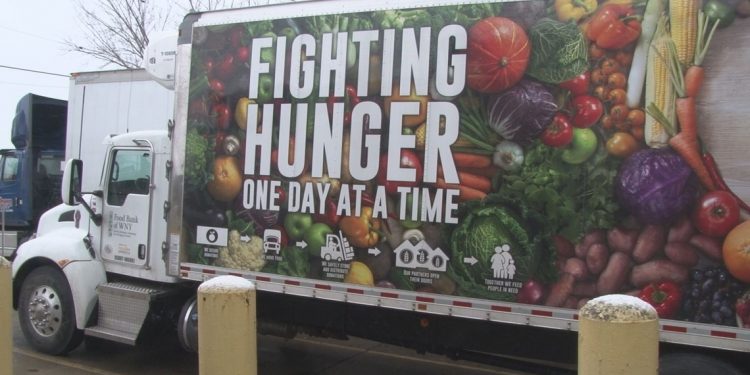 Following a food donation from FeedMore WNY’s warehouse facility to a family in need