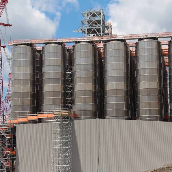 These tanks, shown here in June 2019, will hold the plastic pellets produced by Shell’s ethane cracker. According to Shell, 1.6 million metric tons of plastic will be produced there annually. (Photo by Reid Frazier/The Allegheny Front)