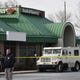 Wayne Police conduct an investigation outside of the Bank of America in Wayne where a robbery suspect was shot by armed guards on 12/18/19.