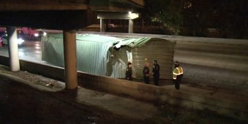 18-wheeler loses cargo container after slamming into Houston Avenue Bridge