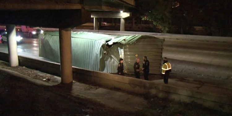 18-wheeler loses cargo container after slamming into Houston Avenue Bridge