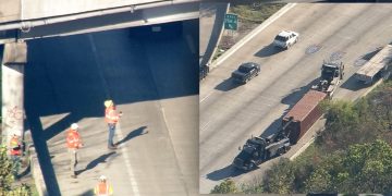 Truck hits overpass on Katy Freeway, loses cargo container