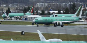 Boeing shares tumble on report of 737 Max production cuts