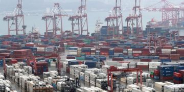 Cargo containers stacked at Busan port – Yonhap News