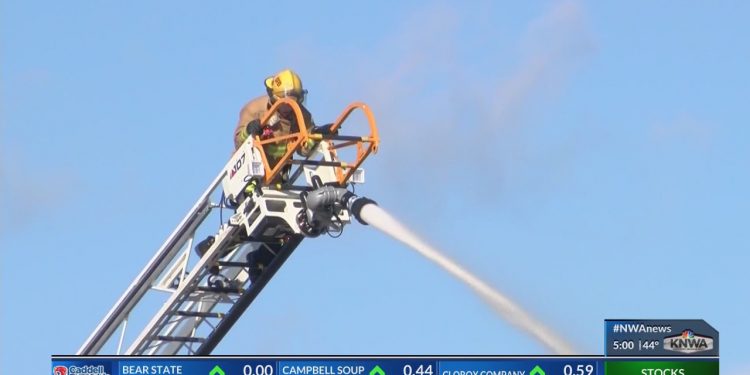 Safety concerns arise as firefighters put out warehouse fire