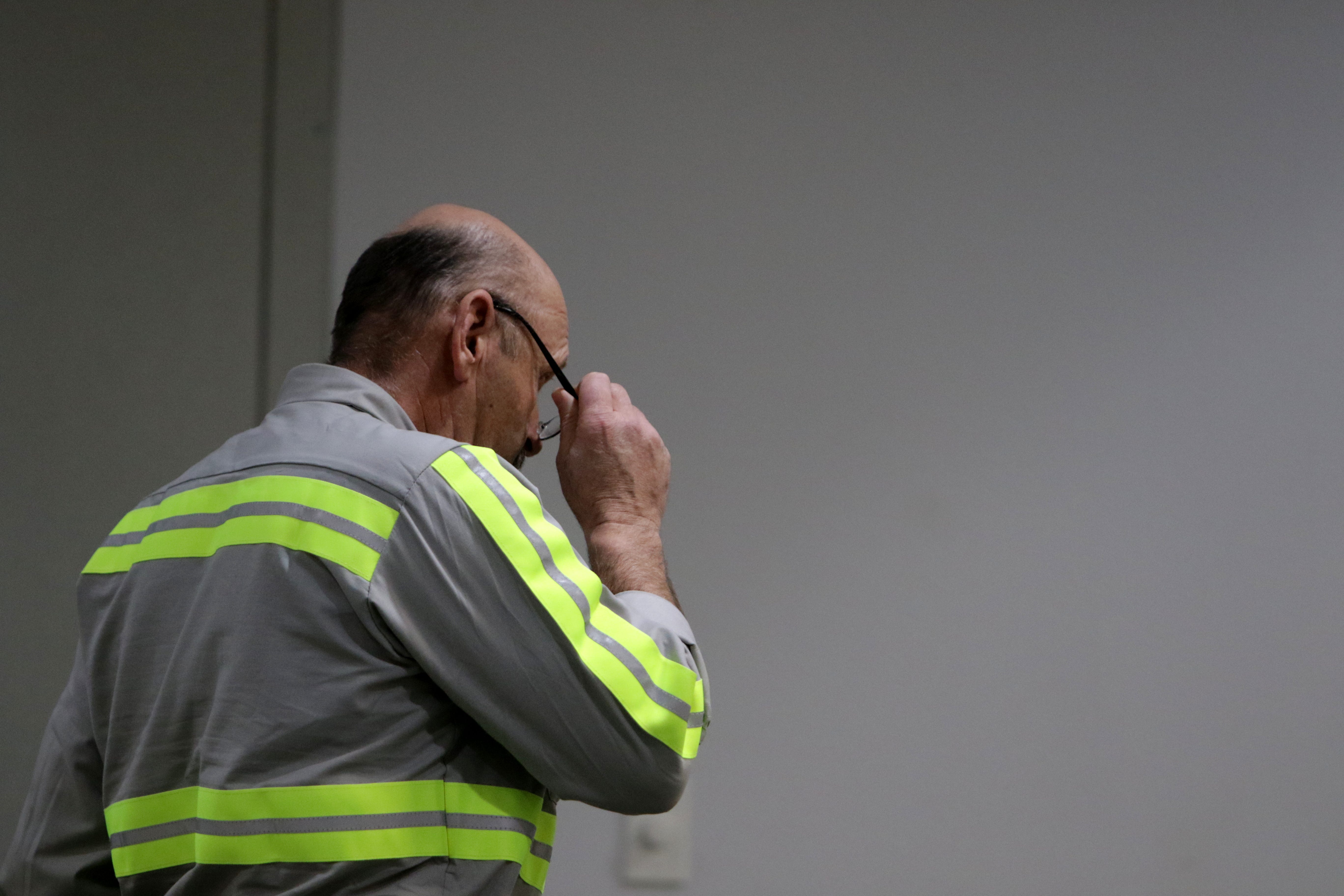 Coal miner Steve Kennedy walks to the front of the room, Monday, Jan. 6, 2020, to voice his support for installing carbon capture at the San Juan Generating Station. Kennedy was one of the miners who spoke during the public hearing at San Juan College about the future of the power plant.