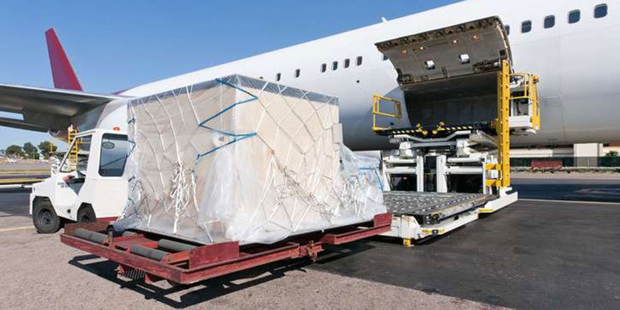 Goods are loaded onto a cargo plane. Kenya and