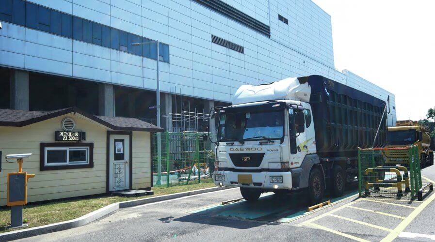A supply truck departs Samsung's semiconductor factory