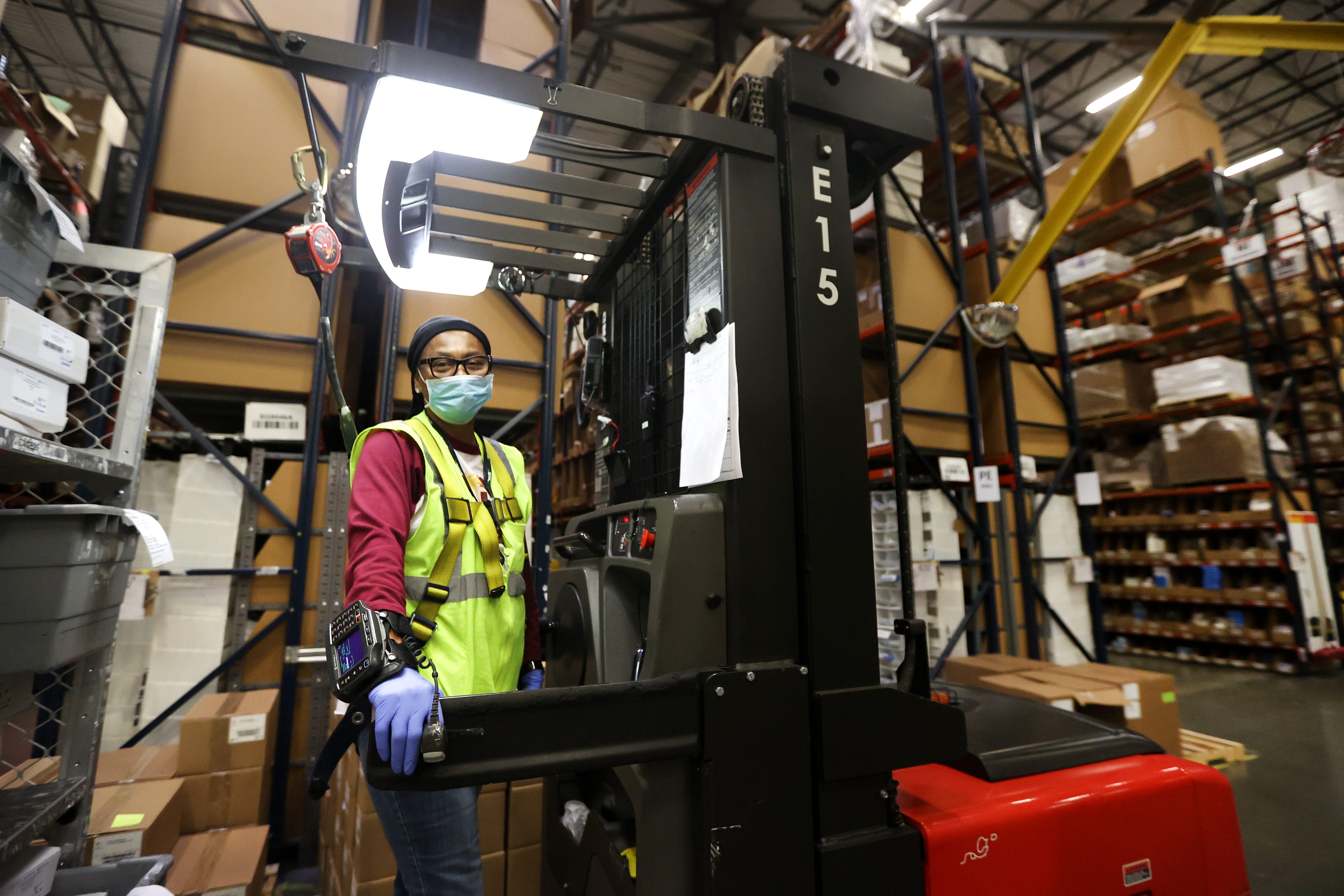 Material Handling Equipment operator Cynthia Blair works inside a DHL Supply Chain facility in Southaven Monday, Oct. 5, 2020. 