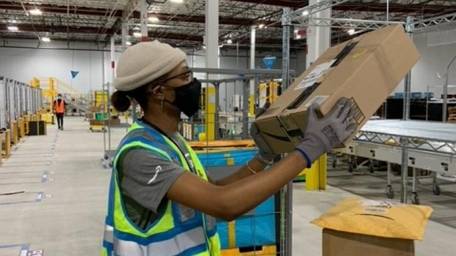 Amazon associate Crystal Anthony works at the retail