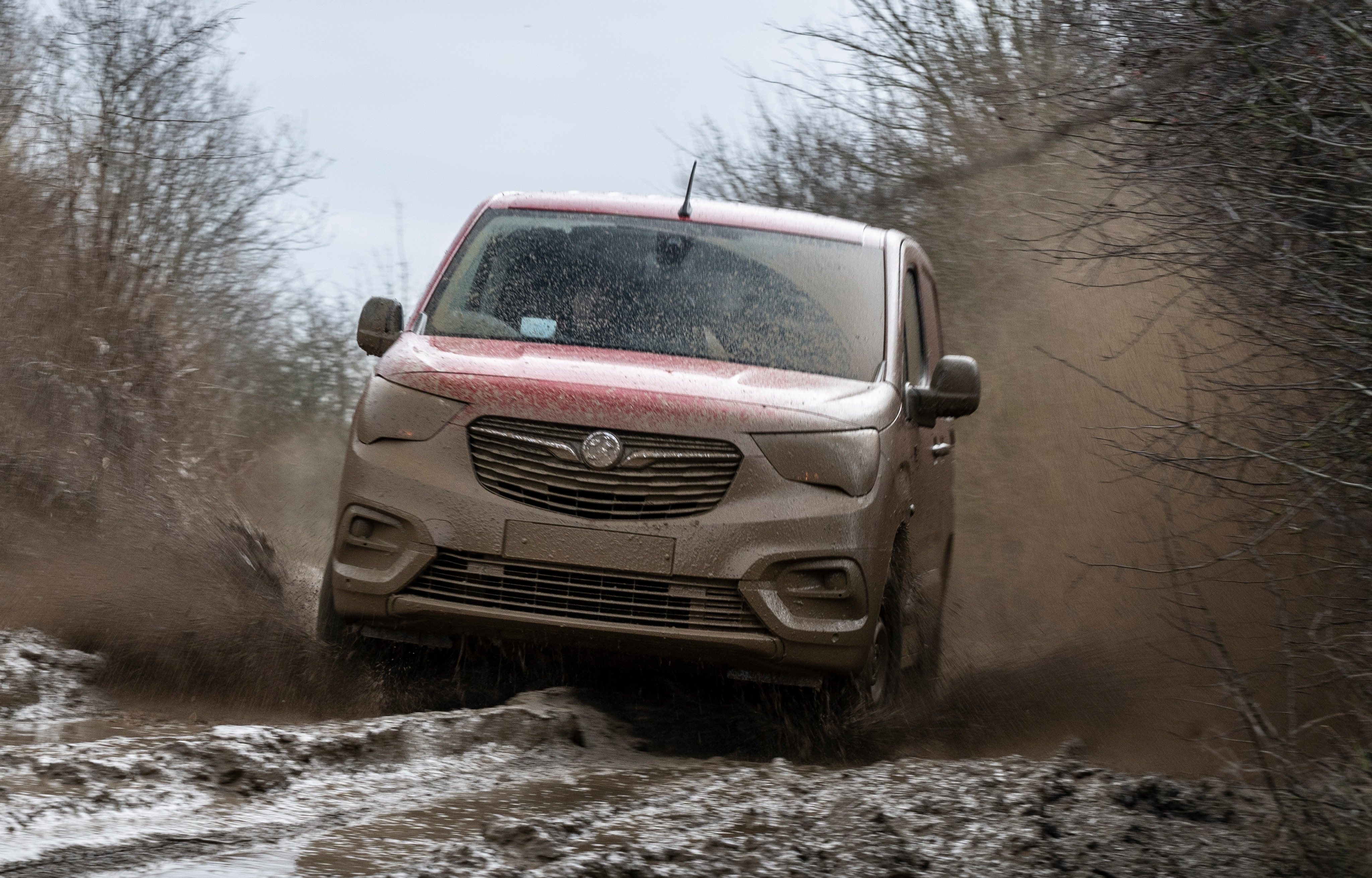 Put the Vauxhall Combi Cargo 4X4 in a muddy playground with a Land Rover Defender and it will go toe to toe with it