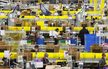 Amazon prepares to administer coronavirus vaccine to its workers in warehouses, Whole Foods stores