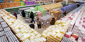 Bargain hunters queue up at ‘gone past best’ warehouse for half-price food