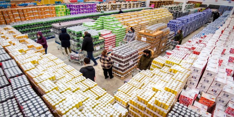 Bargain hunters queue up at ‘gone past best’ warehouse for half-price food