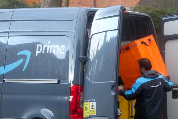 An Amazon driver prepares for a delivery in London