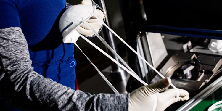 Biden administration steps in to help with the supply chain for N95 masks.