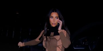 Kim Kardashian Elevates Her Cargo Pants With Booties & This Ab-Revealing Crop Sweater