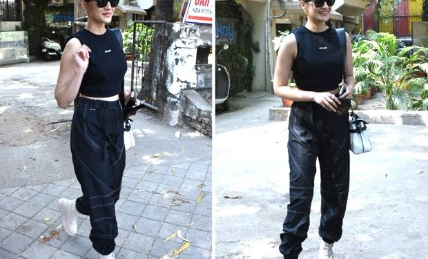 Kriti Sanon keeps it casual in crop top and cargo pants, carries Balmain Paris bag worth Rs. 1.5 lakhs : Bollywood News