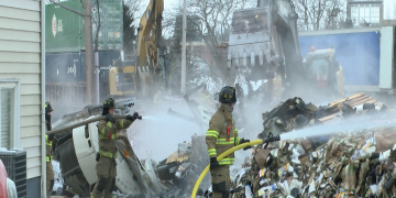 Normal firefighters put out cargo debris fire on Sunday after freight train derailment