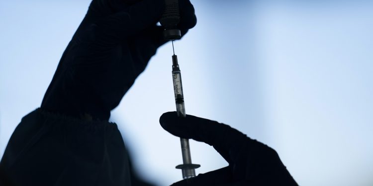 Why we can’t make vaccine doses any faster