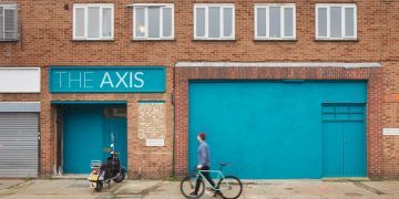 alma-nac turns a two-story brick warehouse into music studios in london
