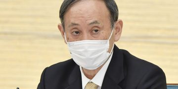 Japan partly ending pandemic emergency, keeps it for Tokyo