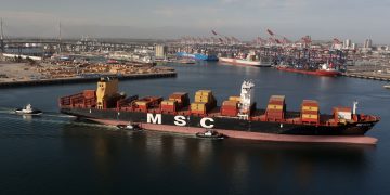Resolving global shipping delays ‘may take a while’