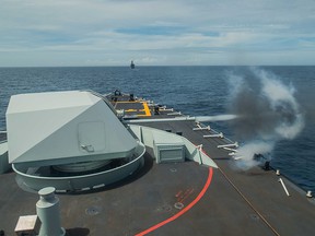 Her Majesty's Canadian Ship Winnipeg conducts a range shoot in cooperation with the Japanese navy during a joint exercise on July 3, 2017.