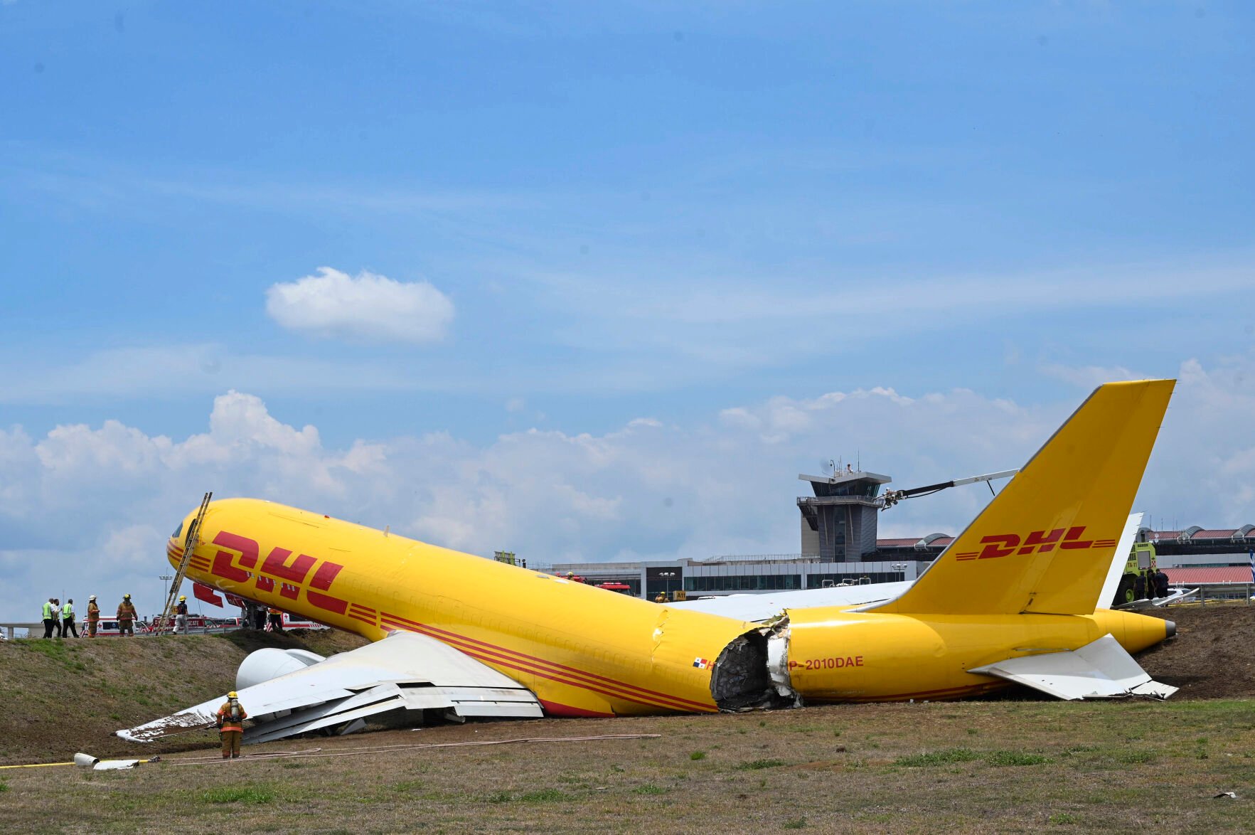 <p>A cargo jet that spun off lays broken on the runway of the Juan Santamaria International Airport in Alajuela, Costa Rica, Thursday, April 7, 2022. According to the fire department, both the pilot and the co-pilot are reported in good health, and accident caused the total closure of the air terminal. (AP Photo/Carlos Gonzalez)</p>